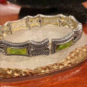3/$10 Silver Tone Stretch Bracelet with Green Cabochons.